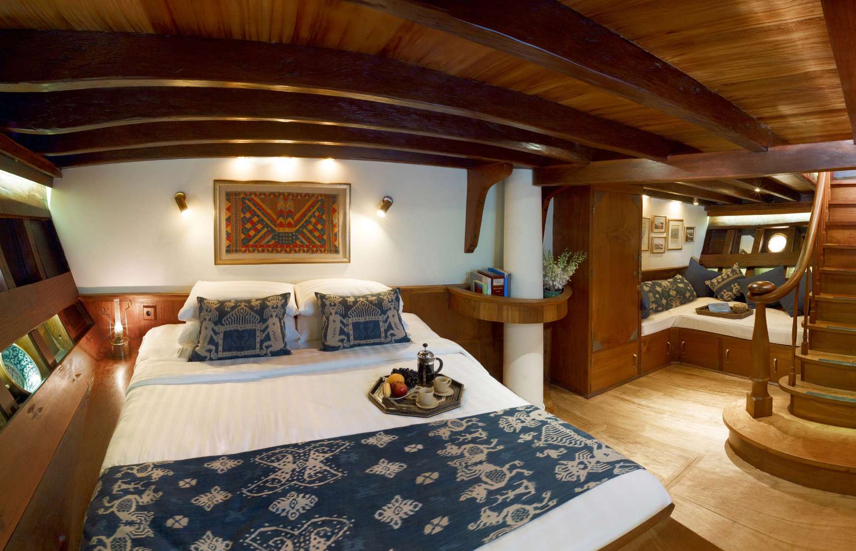 Banda Master Suite on Si Datu Bua with king bed, exposed ironwood beams and Spice Islands décor