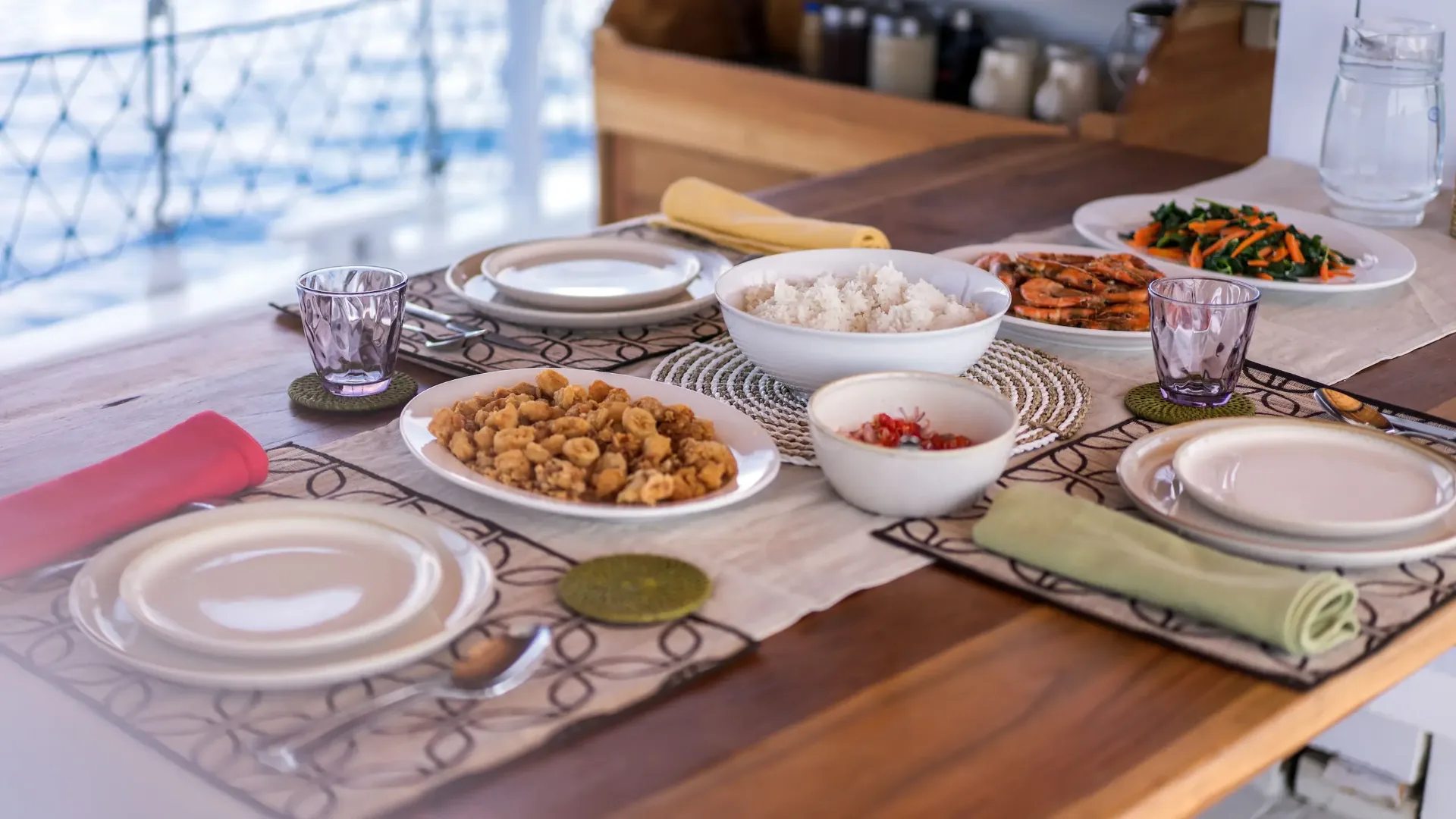 Indonesian lunch of grilled prawns, rice and fried calamari served on Jinggo Janggo