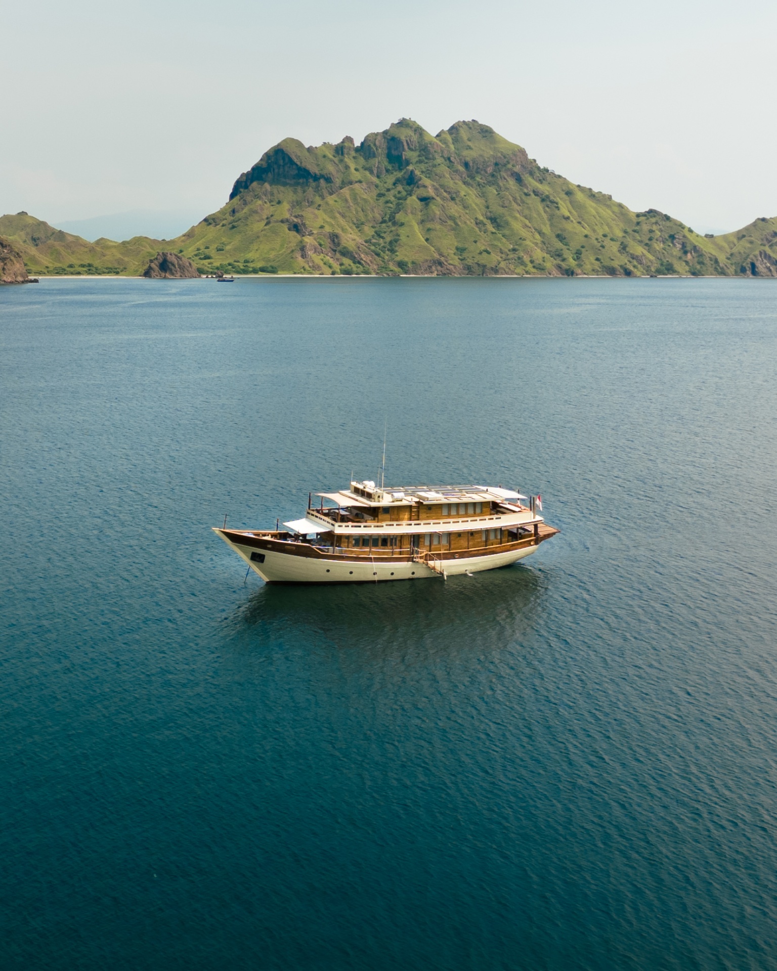 Mischief anchored in front of the emerald peaks of Padar Island