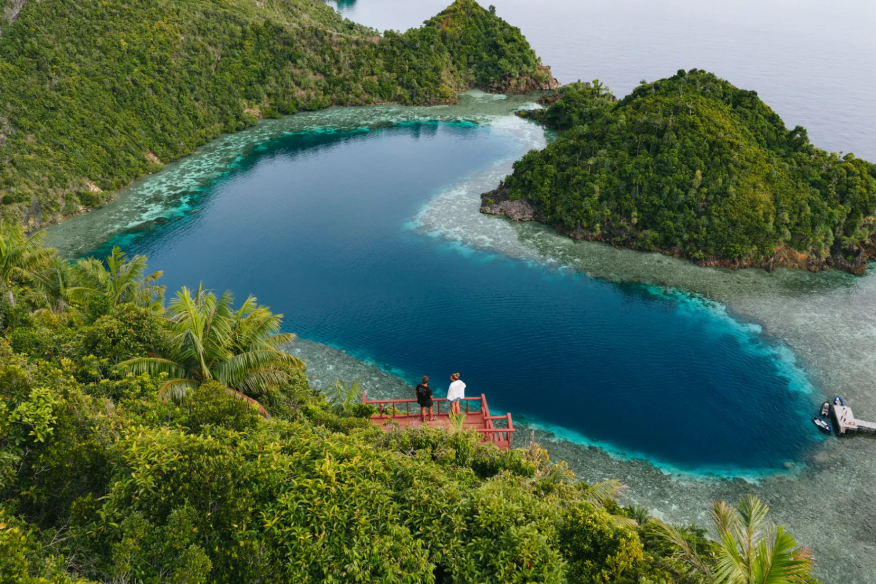 Guests at Love Lagoons viewpoint overlooking Raja Ampat reef from a Mutiara Laut excursion