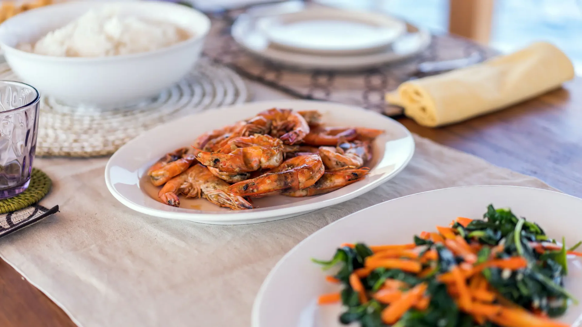 Grilled prawns, rice and sautéed vegetables served on Jinggo Janggo