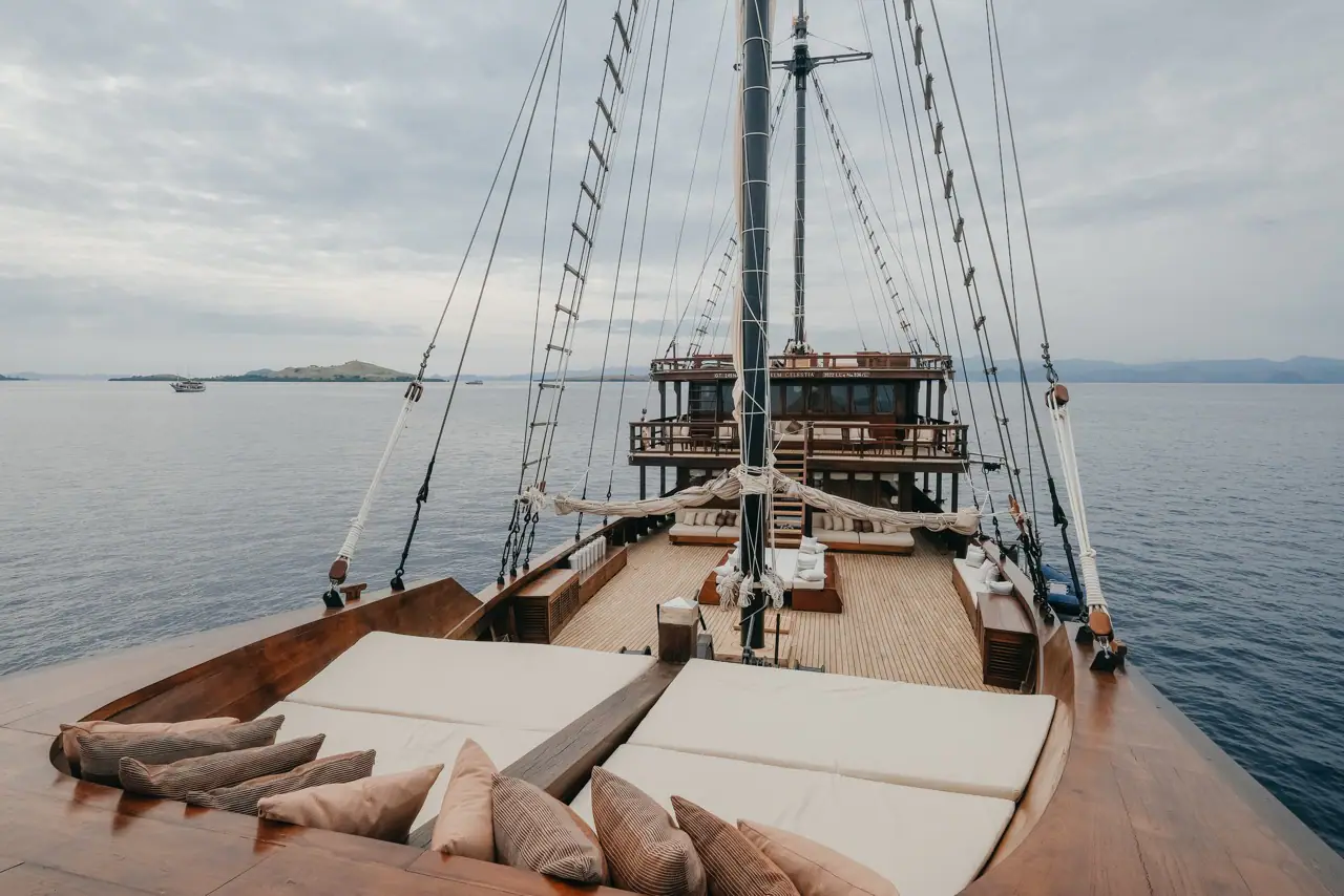 Celestia bow daybeds facing the wheelhouse with view of Komodo hills