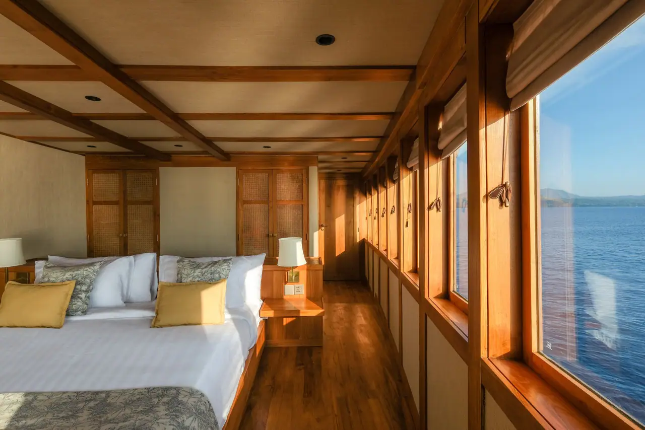 Celestia owner's suite ocean view through teak-framed windows
