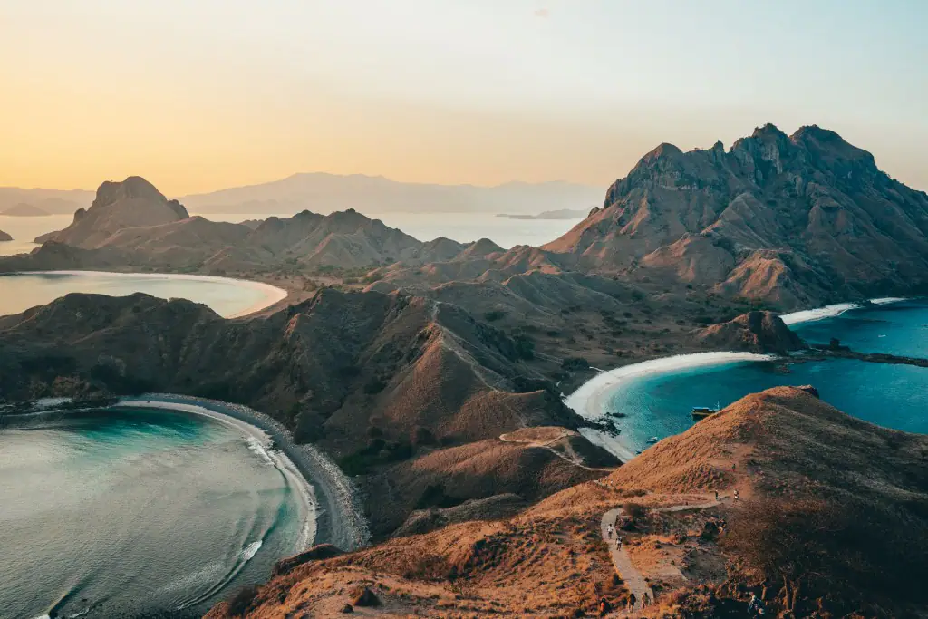 Padar Island viewpoint with three curved bays at sunset in Komodo