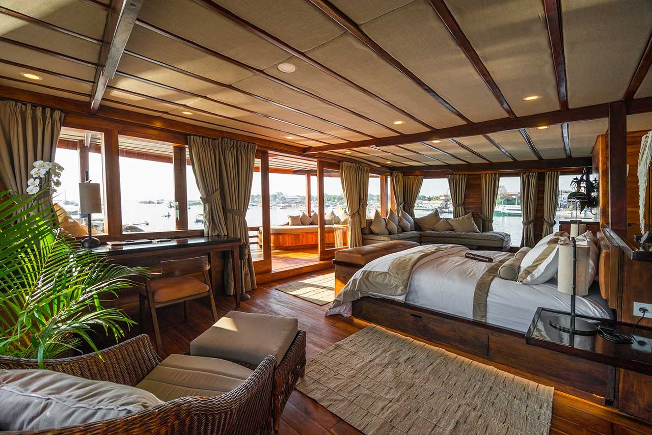 Prana by Atzaró suite with private terrace and daybed overlooking the sea