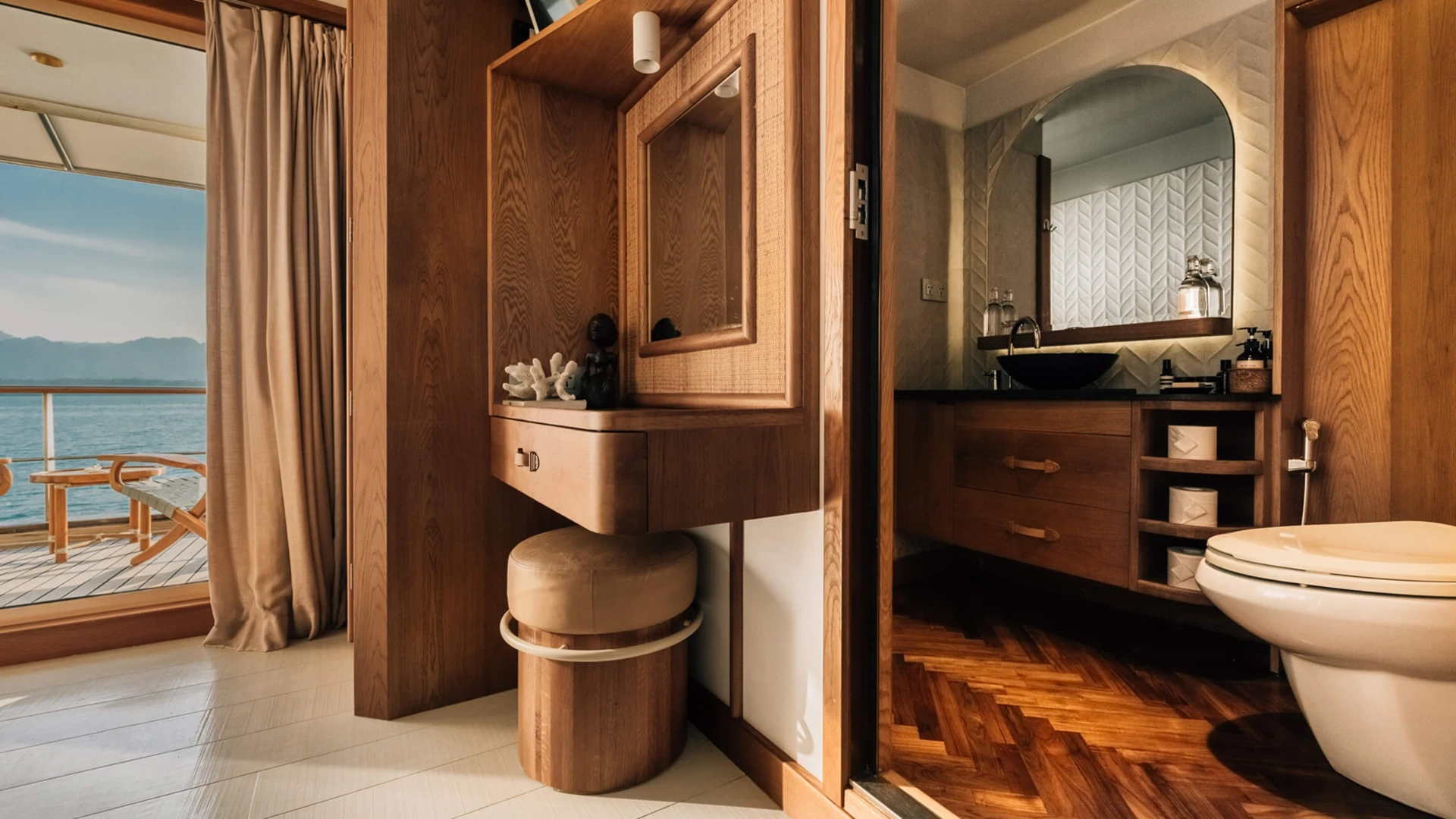 Cabin ensuite bathroom on Kudanil Explorer with timber vanity and herringbone floor