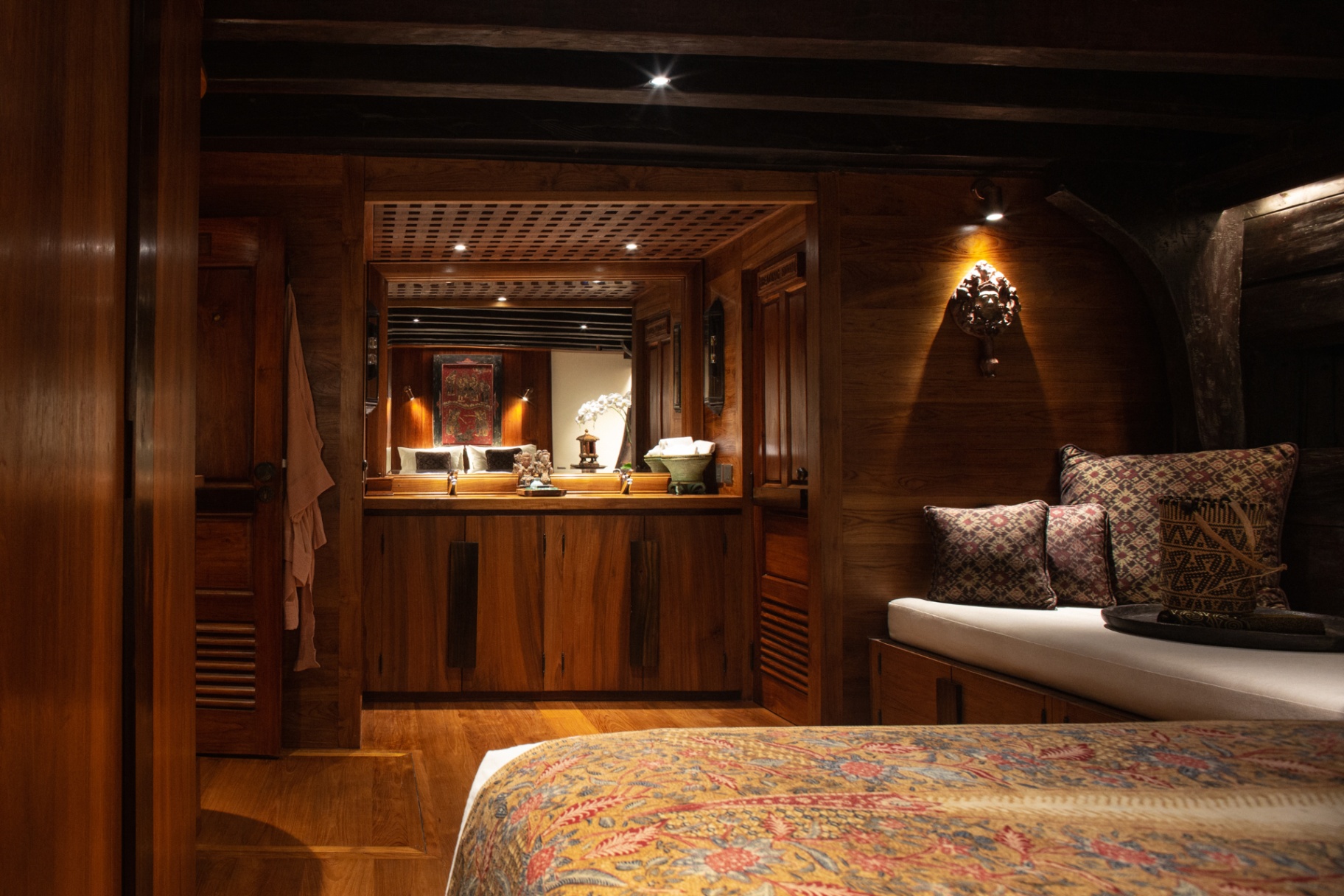 Silolona suite looking through to the ensuite dressing area with antique lacquer panel