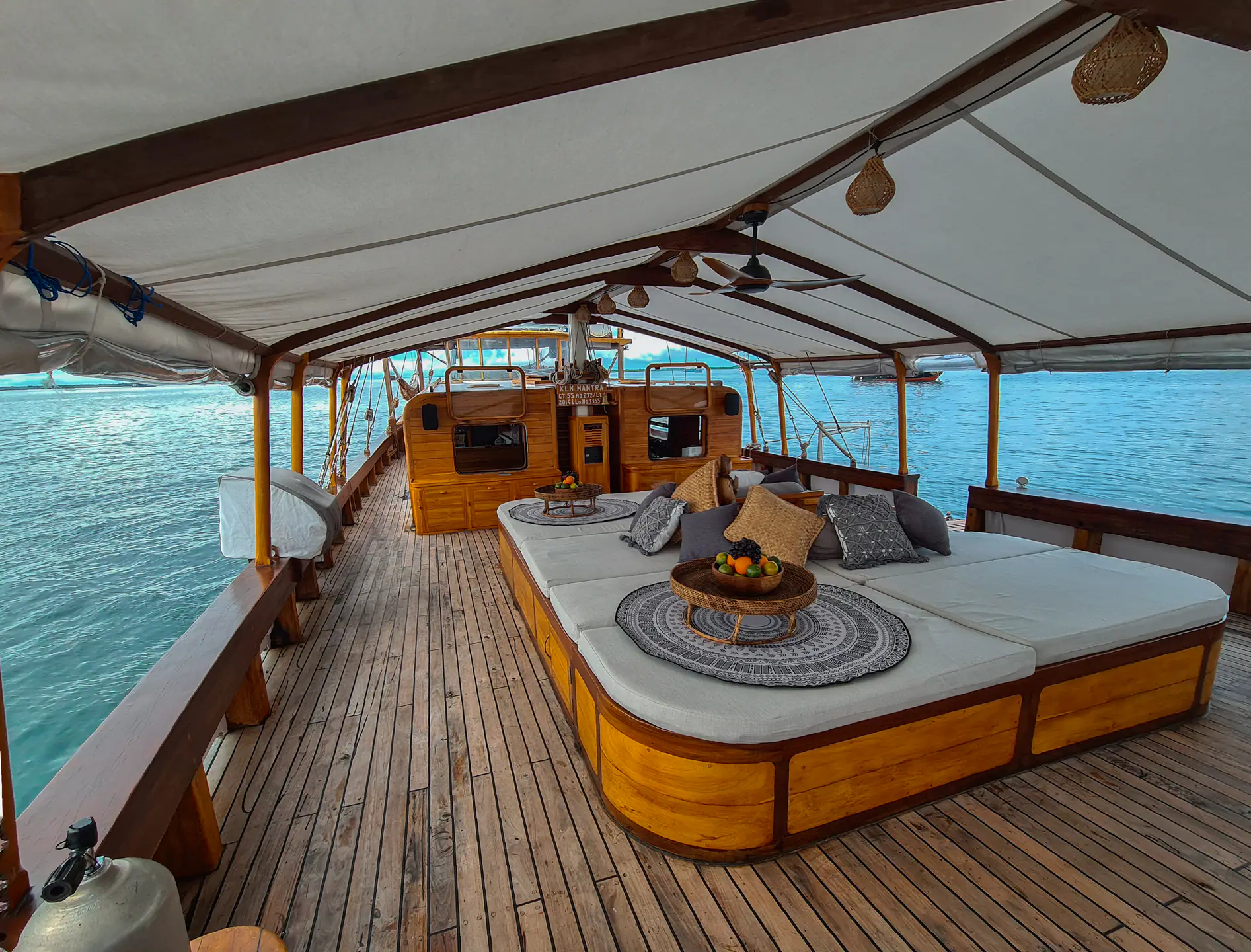Anne Bonny main deck with large daybed and canopy shade